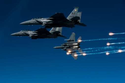 December 17, 2010 - A U.S. Air Force F-15E Strike Eagle aircraft releases flares during a local training mission over Seymour Johnson Air Force Base, North Carolina.