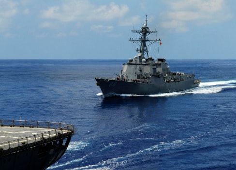 Guided-missile destroyer USS Preble approaching the Military Sealift Command oiler USNS John Ericsso