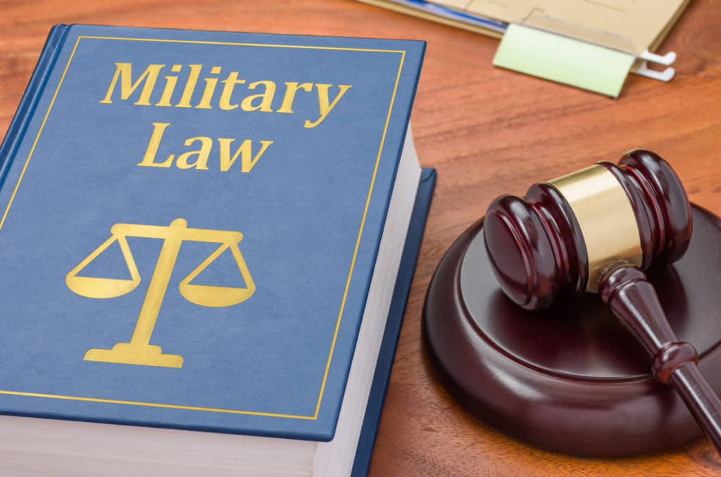 A law book with a gavel - Military law