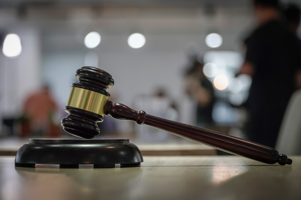 Judge Gavel hammer wood on bokeh background Judge Gavel black hammer wood on bokeh background